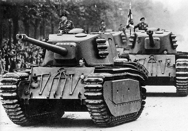 ARL-44 heavy tanks on parade driving through the streets of Paris on Bastille Day