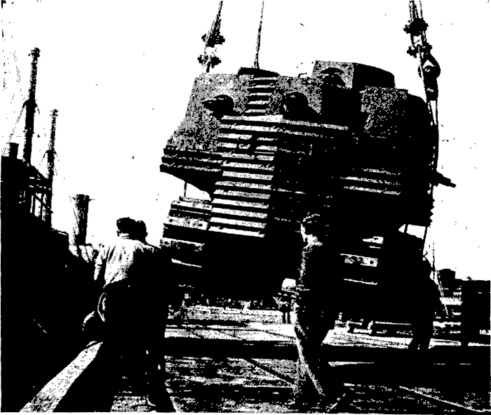 Semple Tank being loaded/unloaded at a port as part of its journey to Auckland, May 1941 