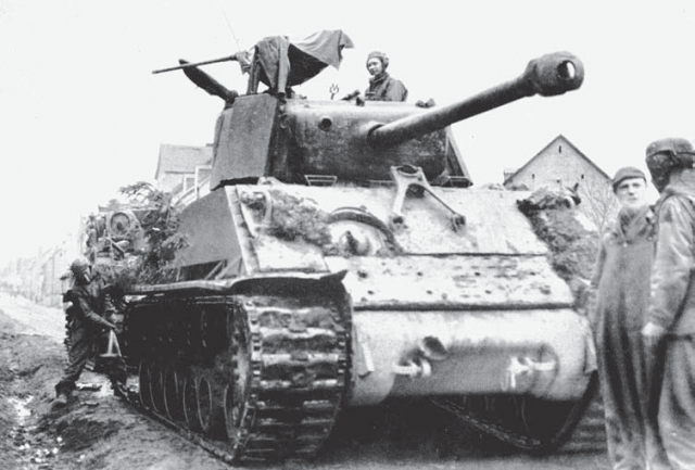 This up armored M4A3 (76) HVSS of the 4th Armoured Division shows the addition of armor plate to the glacis and turret.