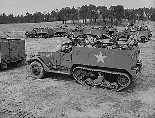 M2 Halftrack scout cars, Fort Benning (Georgia), training. Notice the early liquid-cooled browning standard machine guns.