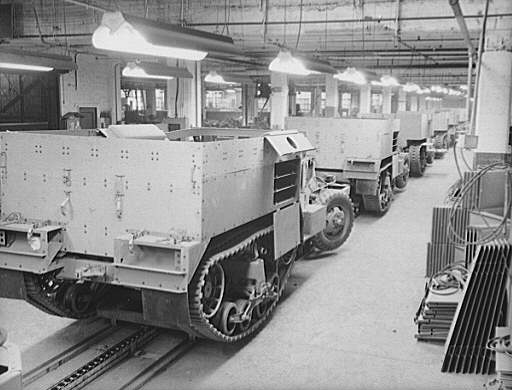 Partially finished M2 halftrack scout cars on the assembly line from the Diebold Safe and Lock Company, Canton, Ohio.